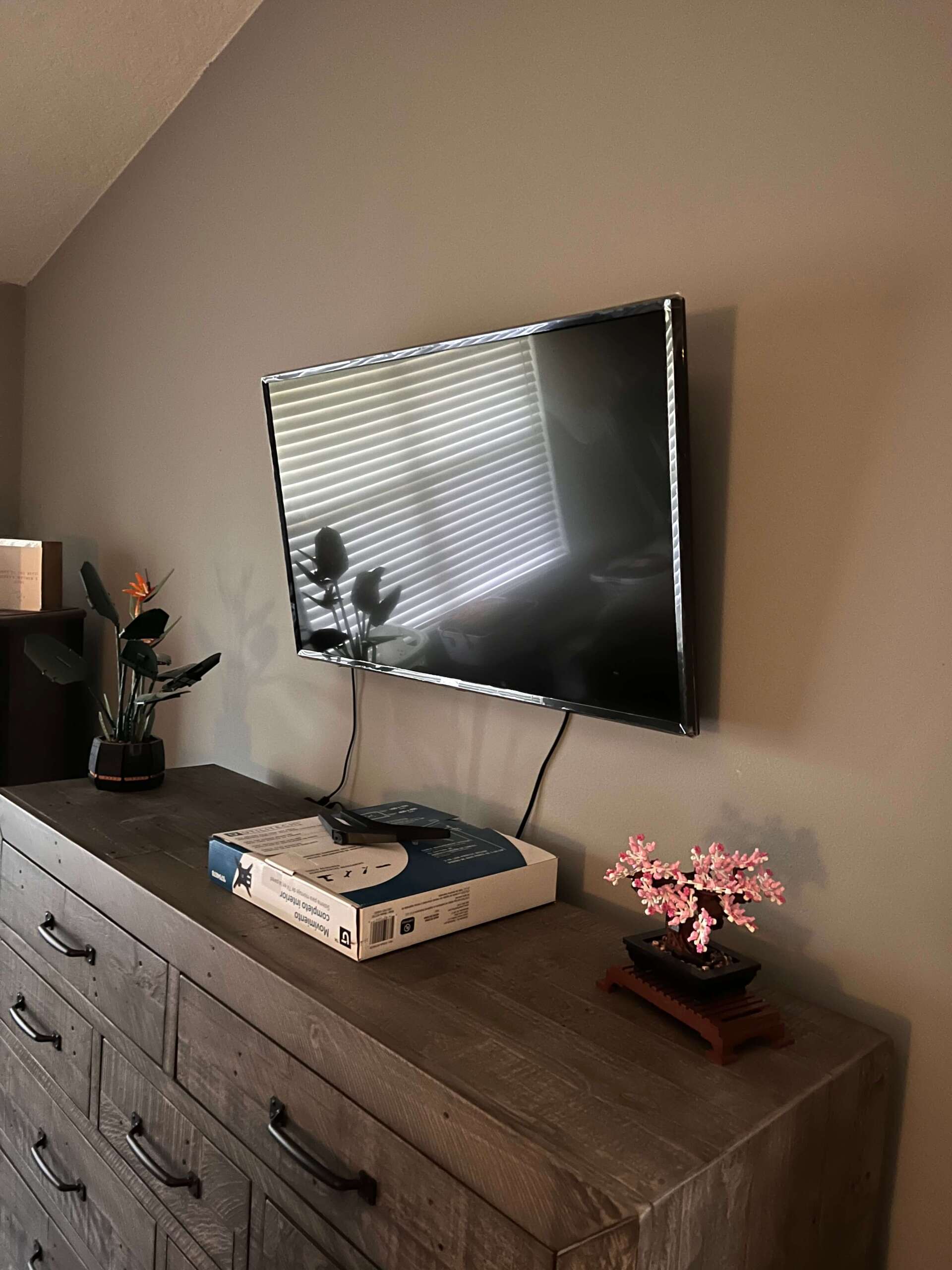 tv mounted on wall