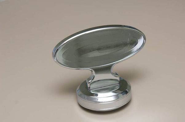 Chrome soap dish with an oval soap holder.