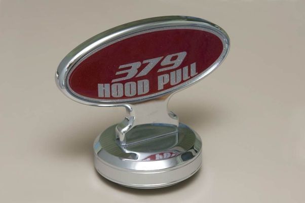 Chrome and maroon 379 hood pull.
