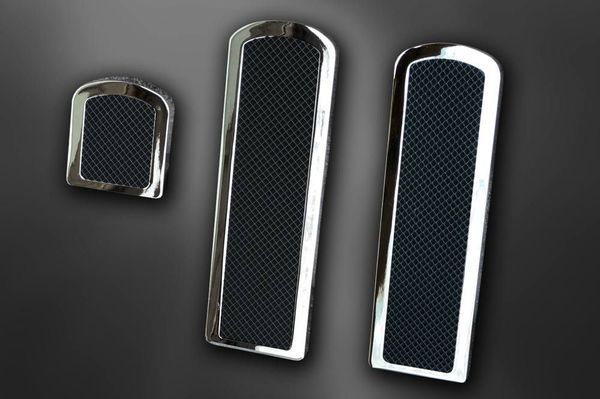Chrome car pedal covers with black non-slip pads.
