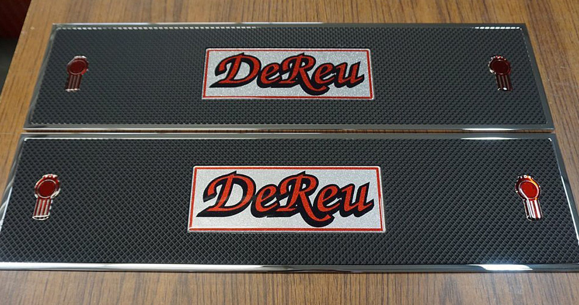 Two black truck floor mats with
