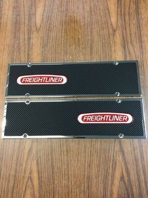 Two Freightliner logo license plate frames with a black carbon fiber pattern.