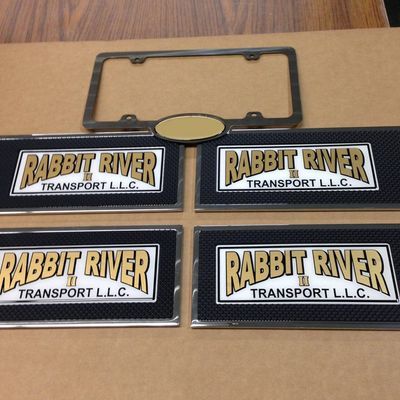 Four rectangular signs with the