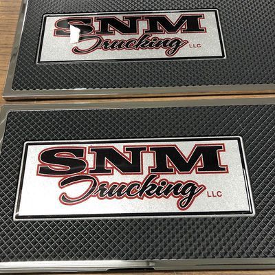 Two rectangular truck step plates with