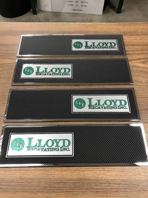 Four rectangular bar mats with