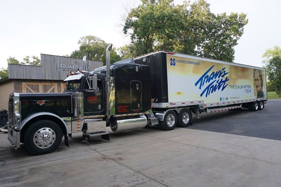 Black semi-truck with trailer, 