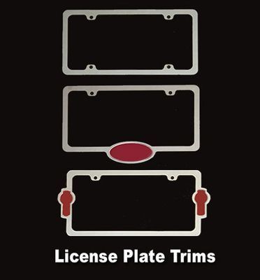 Three silver license plate frames with red accent trims on a black background.
