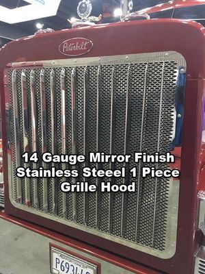 Red Peterbilt truck grille with text: 