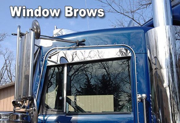 Blue semi-truck with chrome window brows installed above a side window.