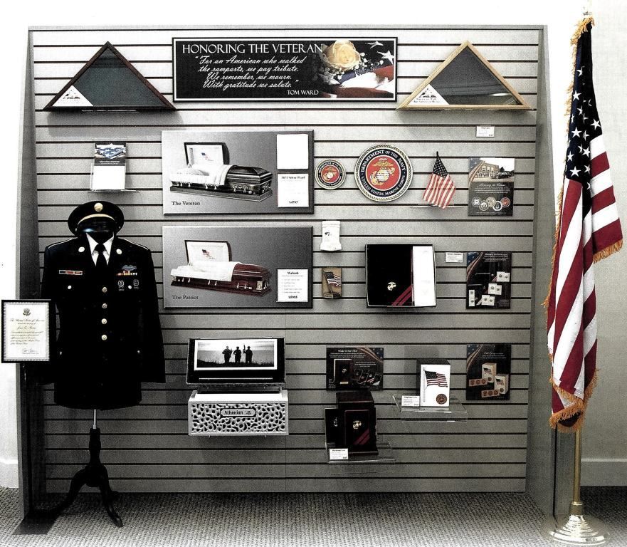 A wall with a sign that says honoring the veterans