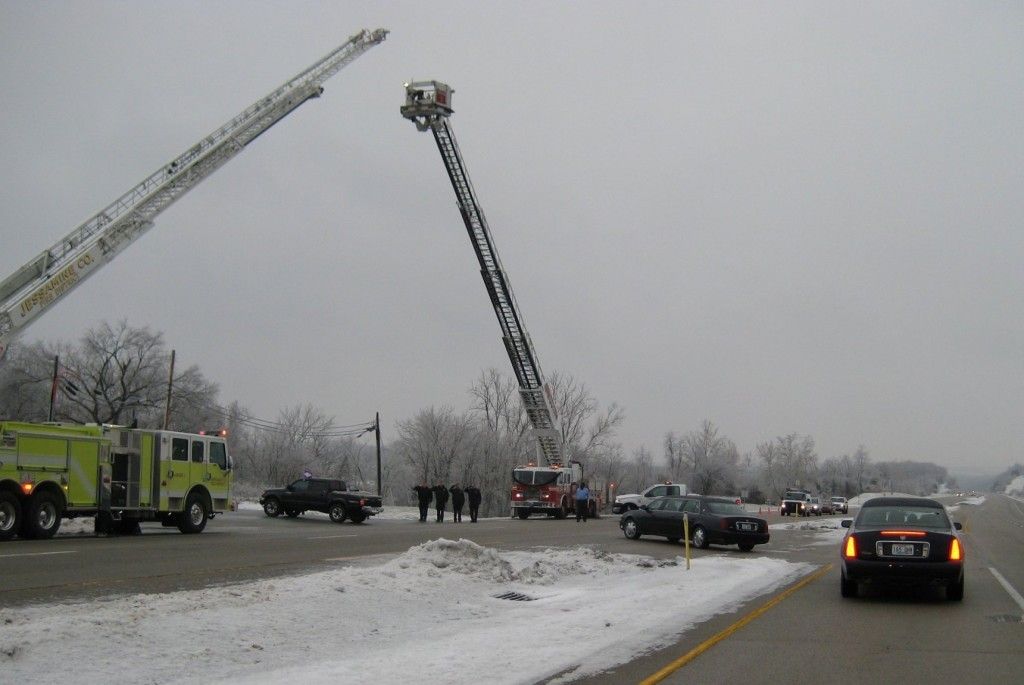 A fire truck is parked on the side of the road
