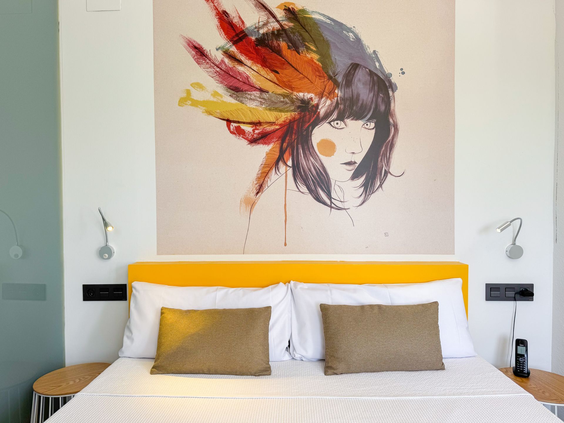 A bathroom with a walk in shower , sink and mirror.