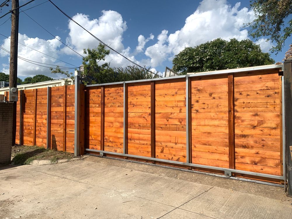 A Wooden Fence With a Sliding Gate — Smiddy's Services In Wyee, NSW