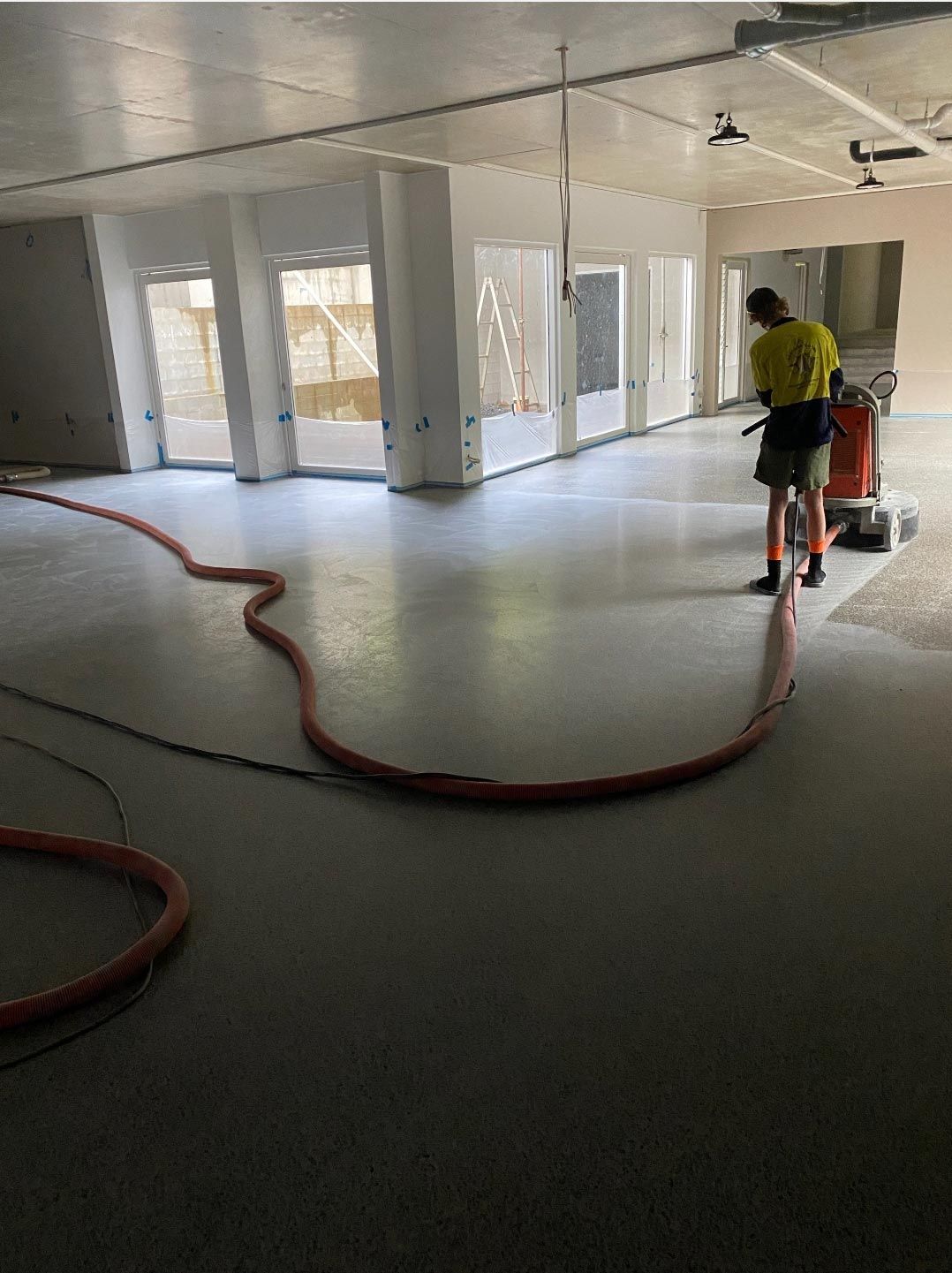 Our team working on site — Flooring in Moomin QLD