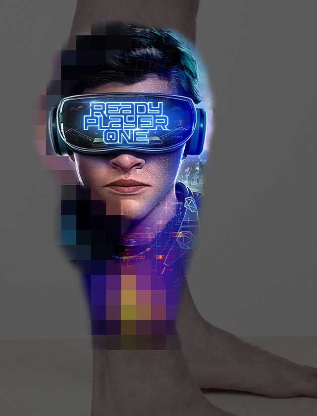 A tattoo of a man wearing a virtual reality headset.