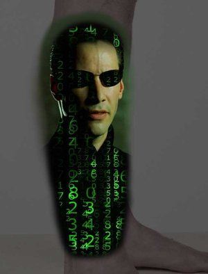 A tattoo of a man with sunglasses on his face