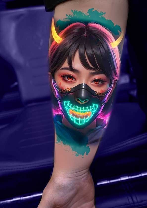A tattoo of a woman wearing a mask with horns on her forearm.
