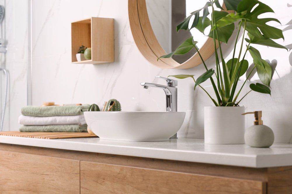 Stylish Vanity With Plants — Bathroom & Laundry Renovations in Coomera, QLD