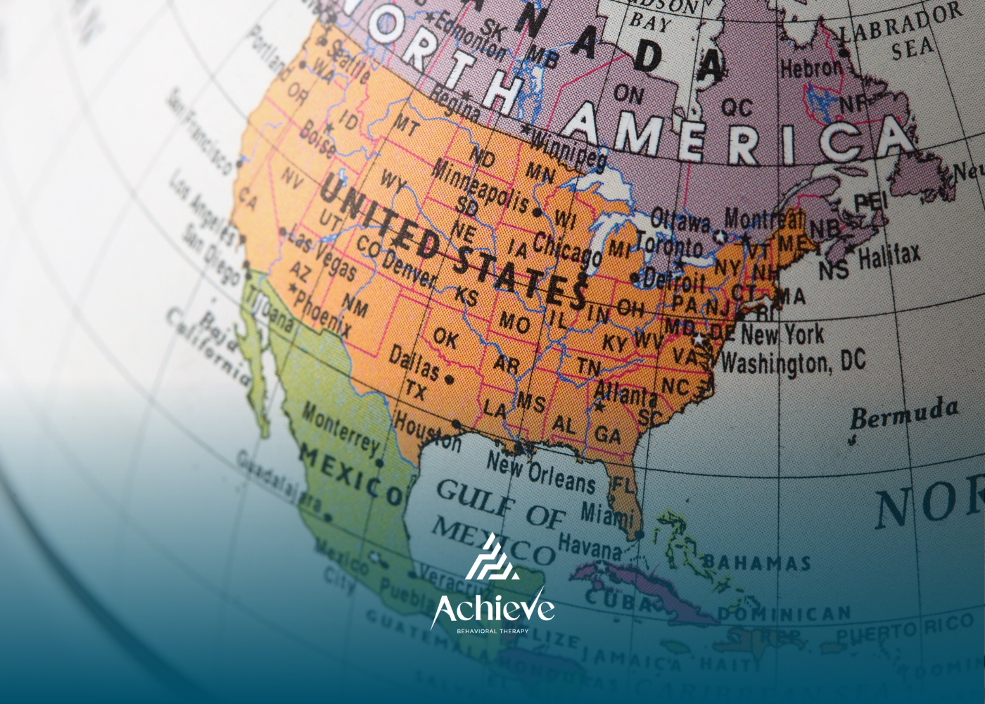 Close-up of a globe showing North America with the United States, Canada, and Mexico labeled.