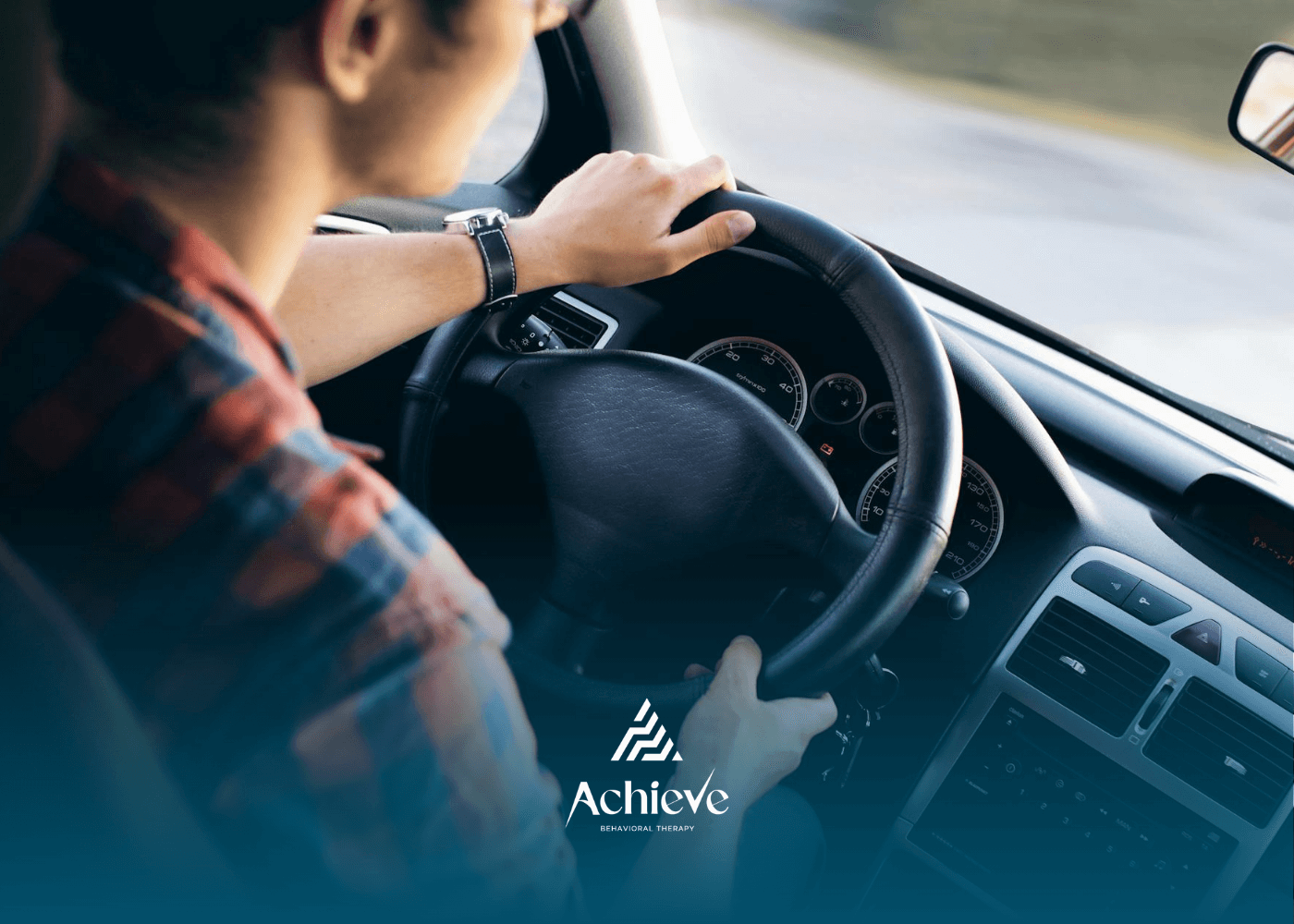 Autistic women driving a car, hands on the steering wheel and focused on the road in New Jersey.
