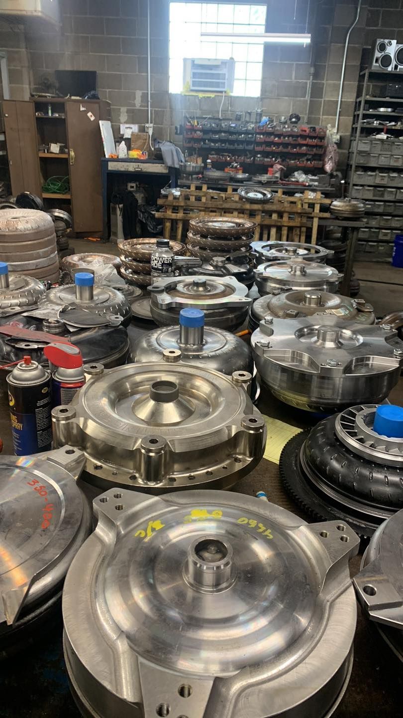 A warehouse filled with lots of different types of gearboxes.