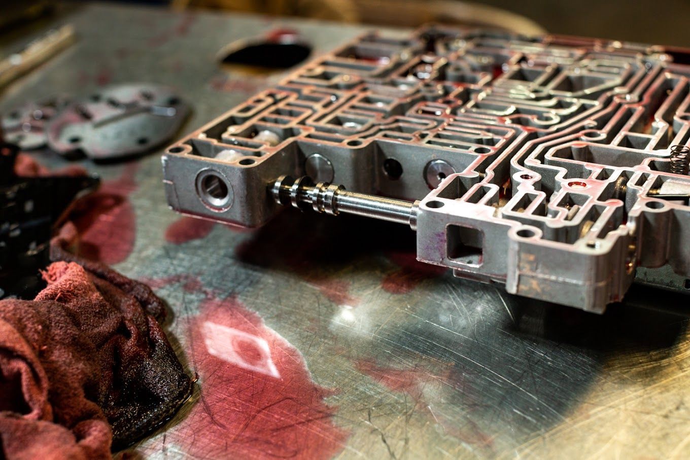 A close up of a gearbox on a table.