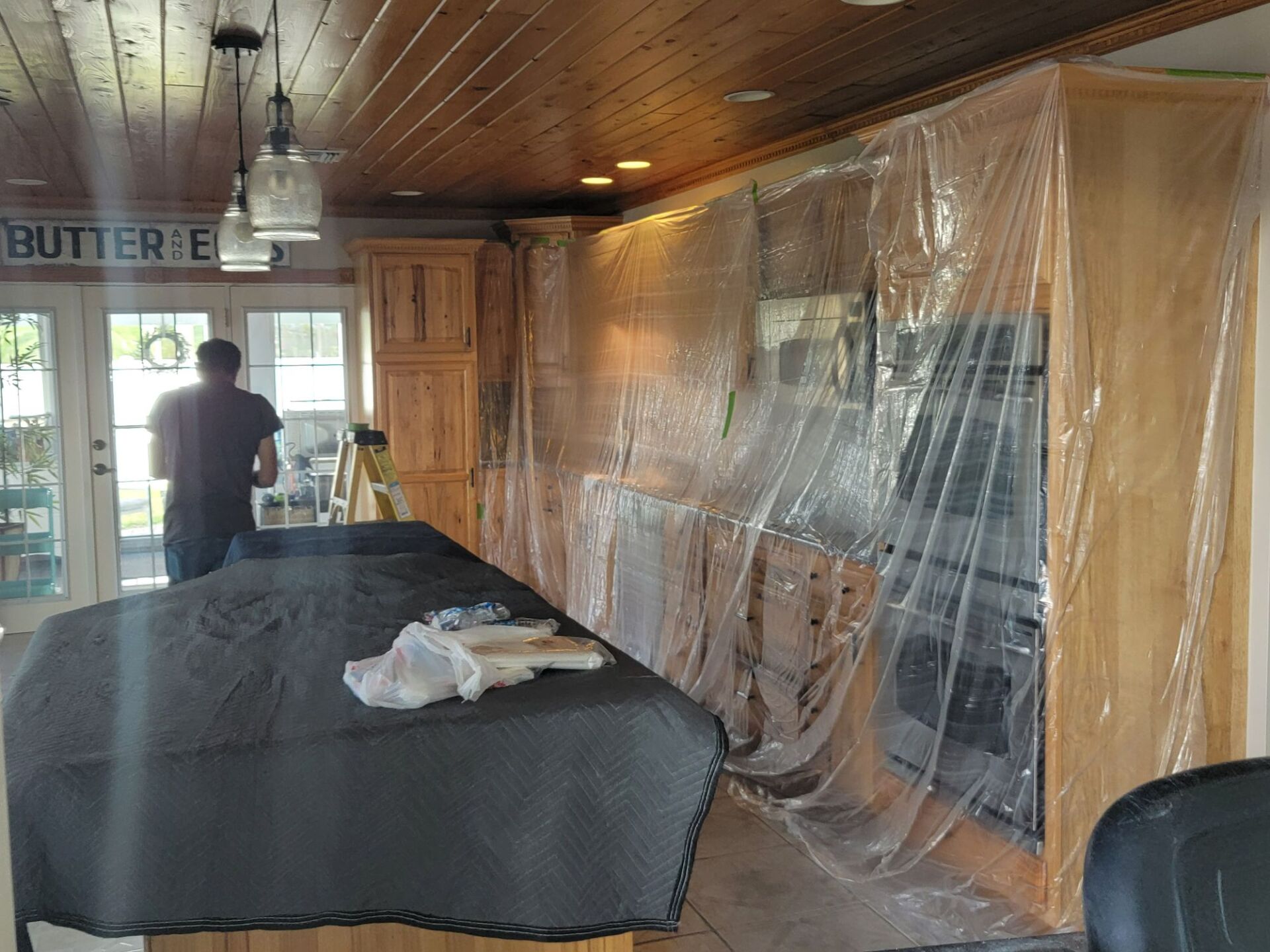 A kitchen with a sign that says butterflies on it