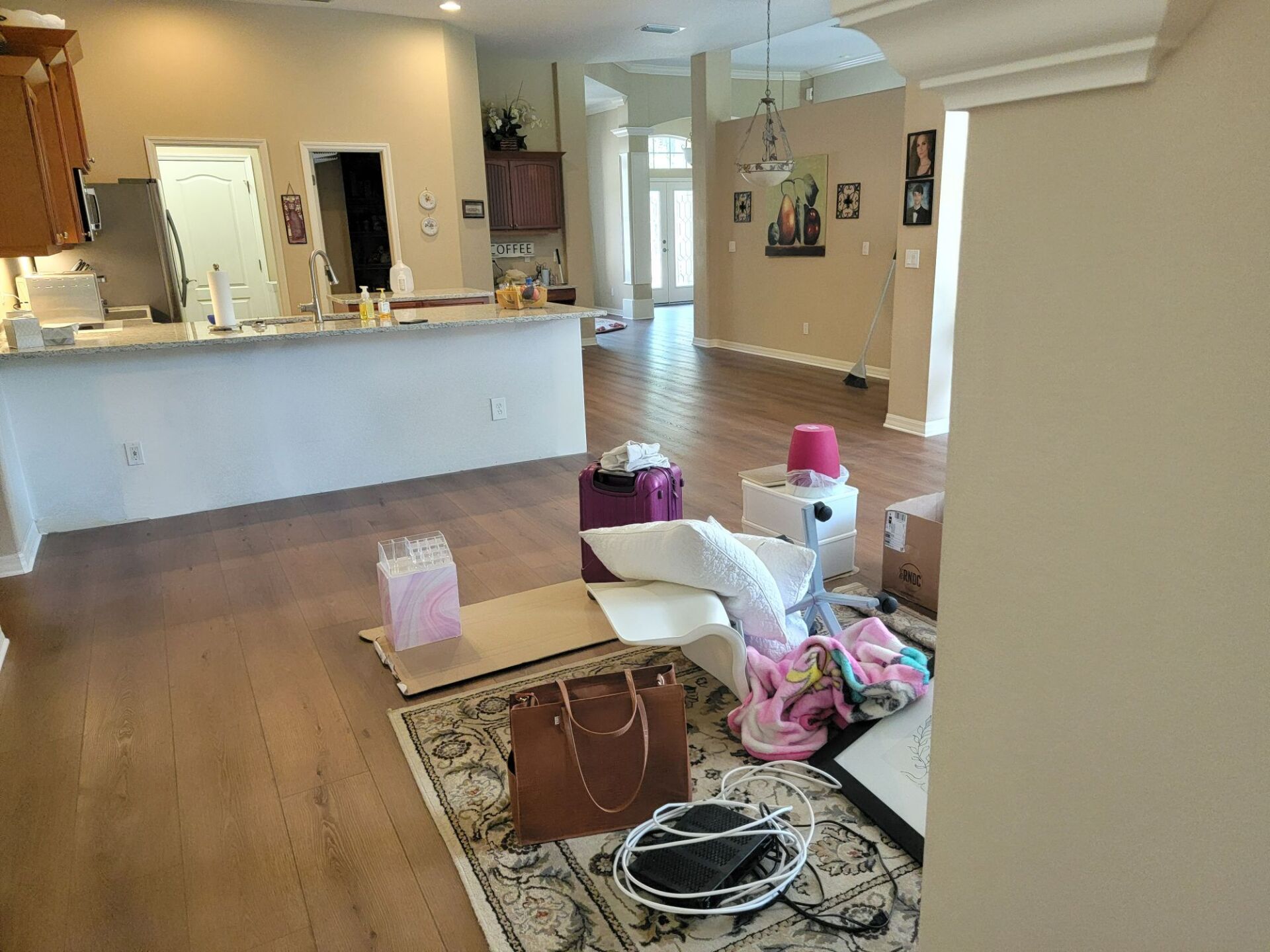 A living room with a lot of boxes and gifts on the floor.