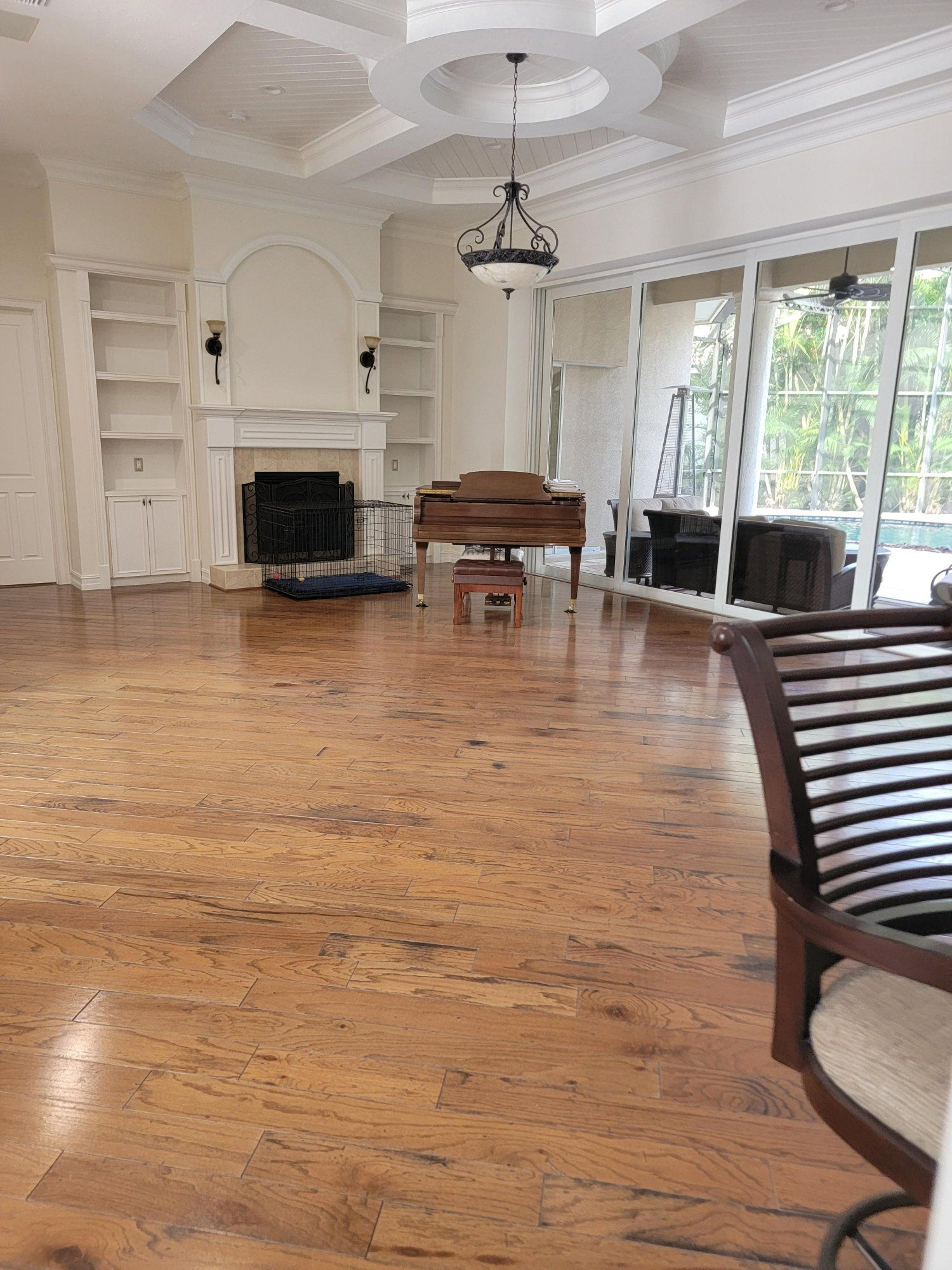 There is a piano in the middle of the room.