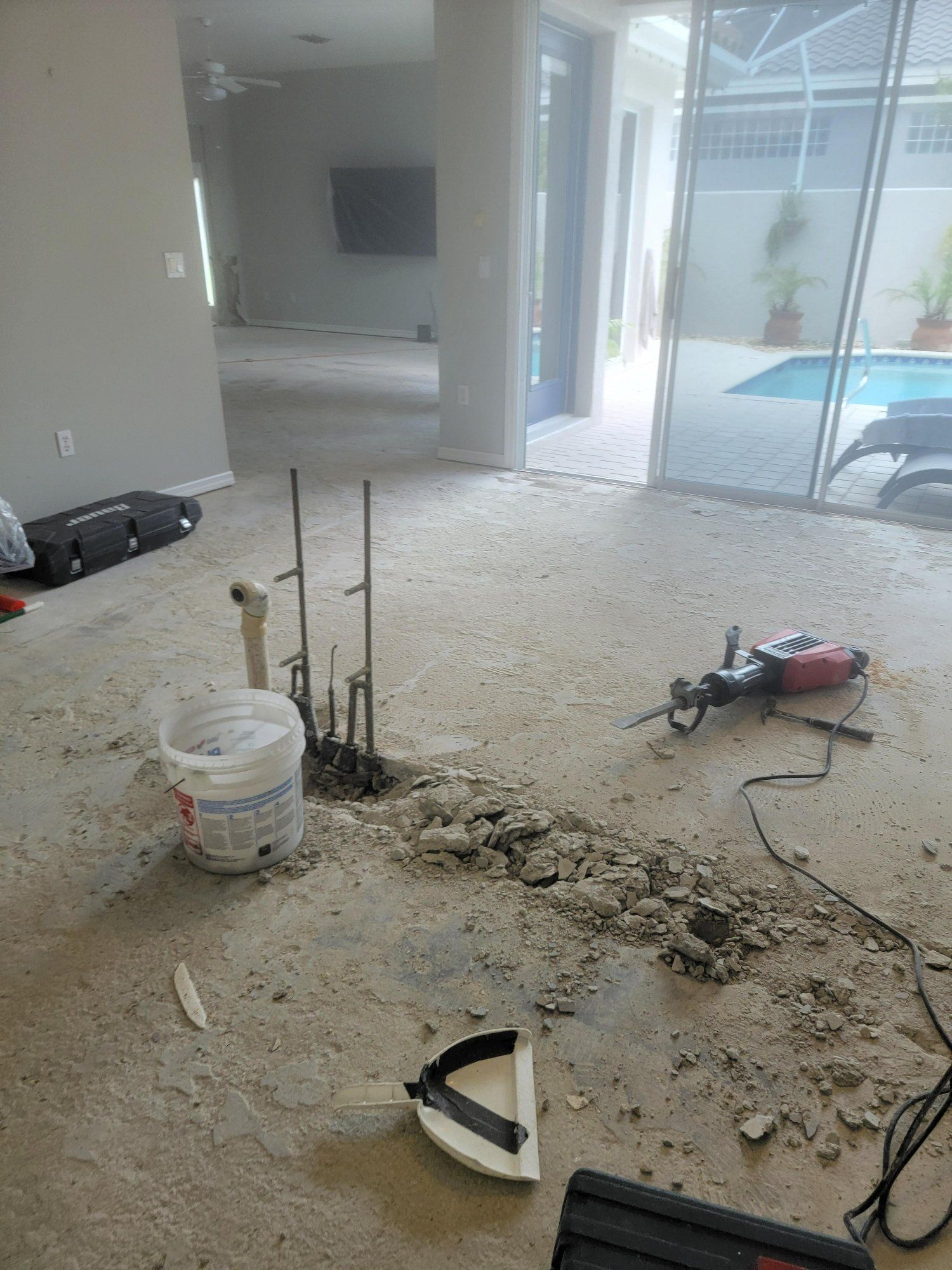 There is a hole in the floor in the middle of the room.