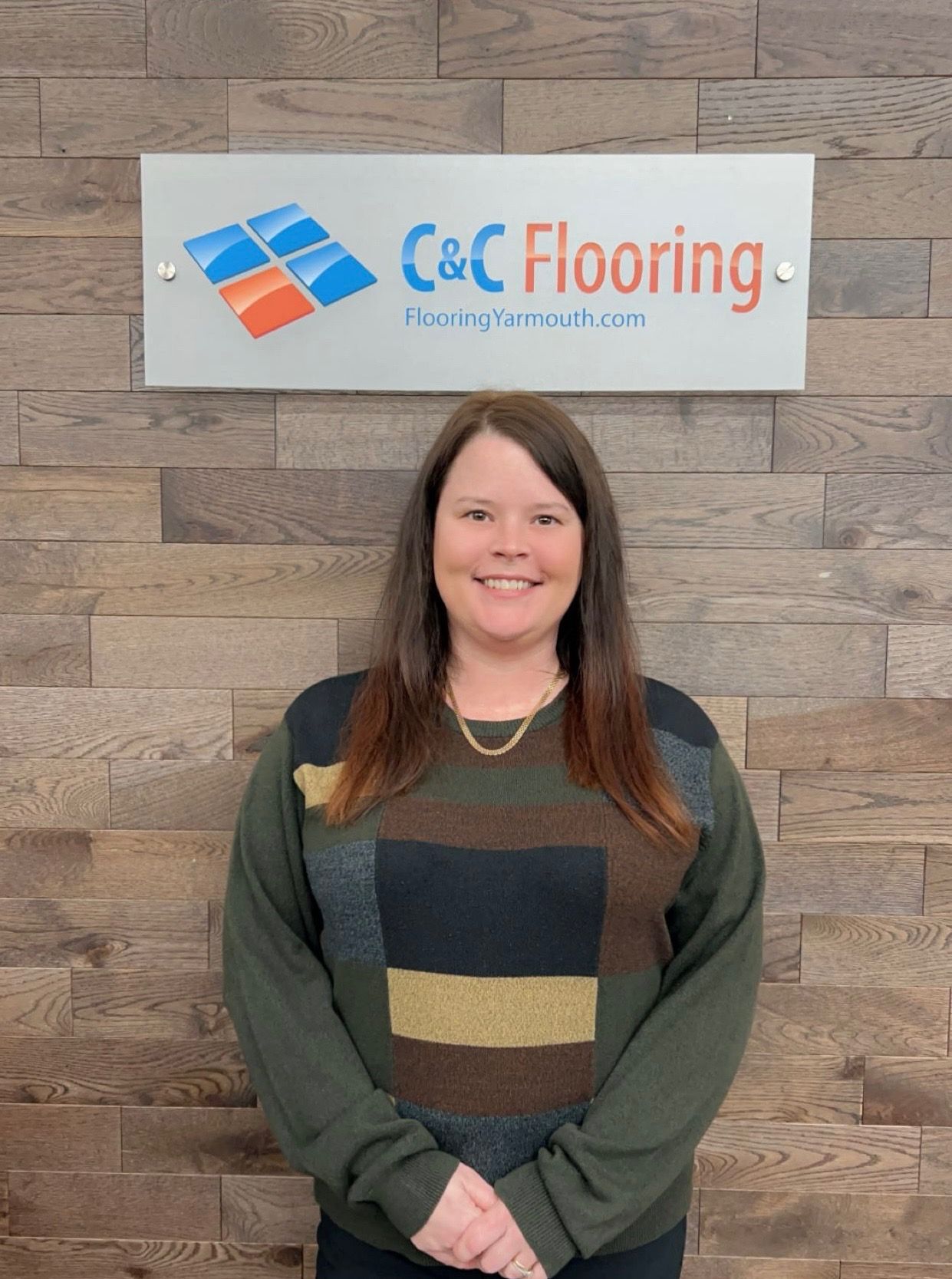 A silhouette of a man without a face on a gray background.