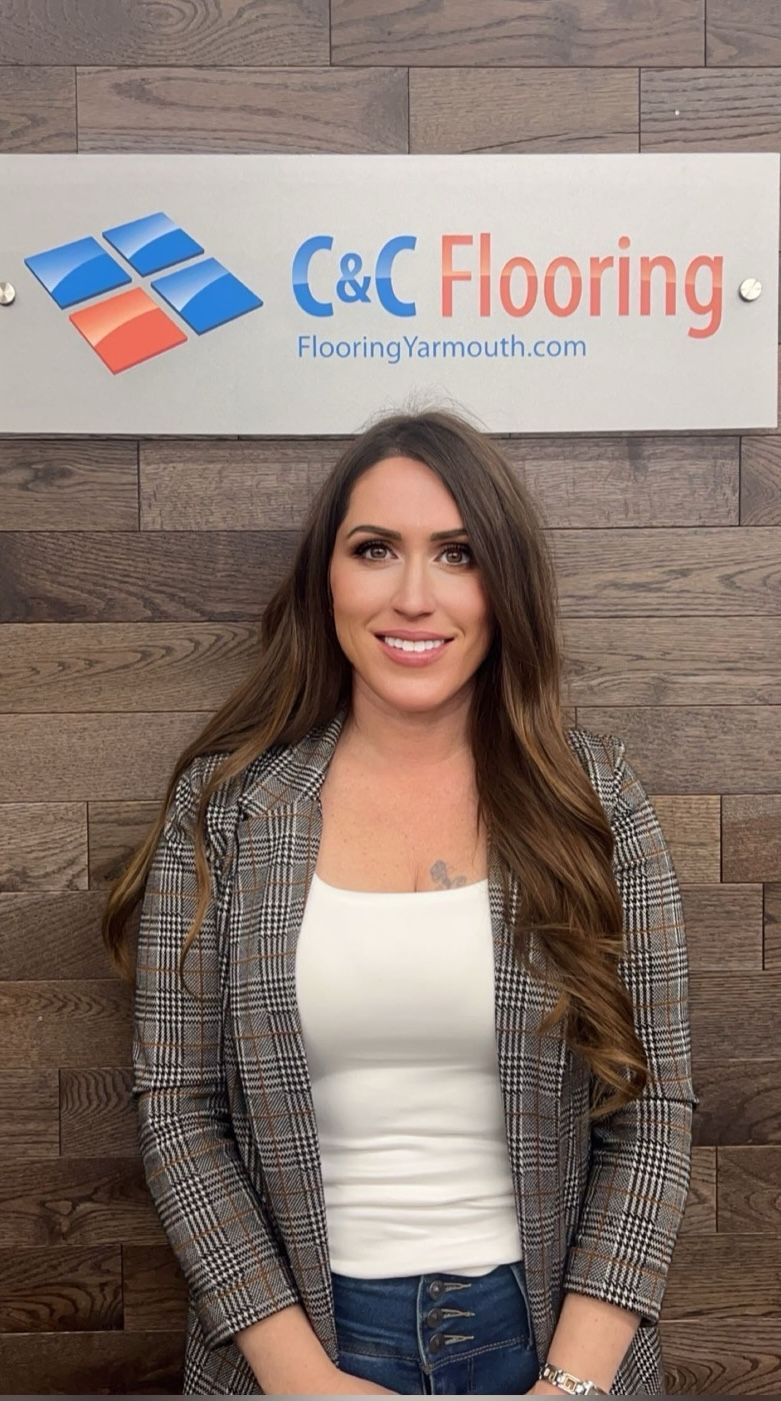 A silhouette of a man without a face on a gray background.