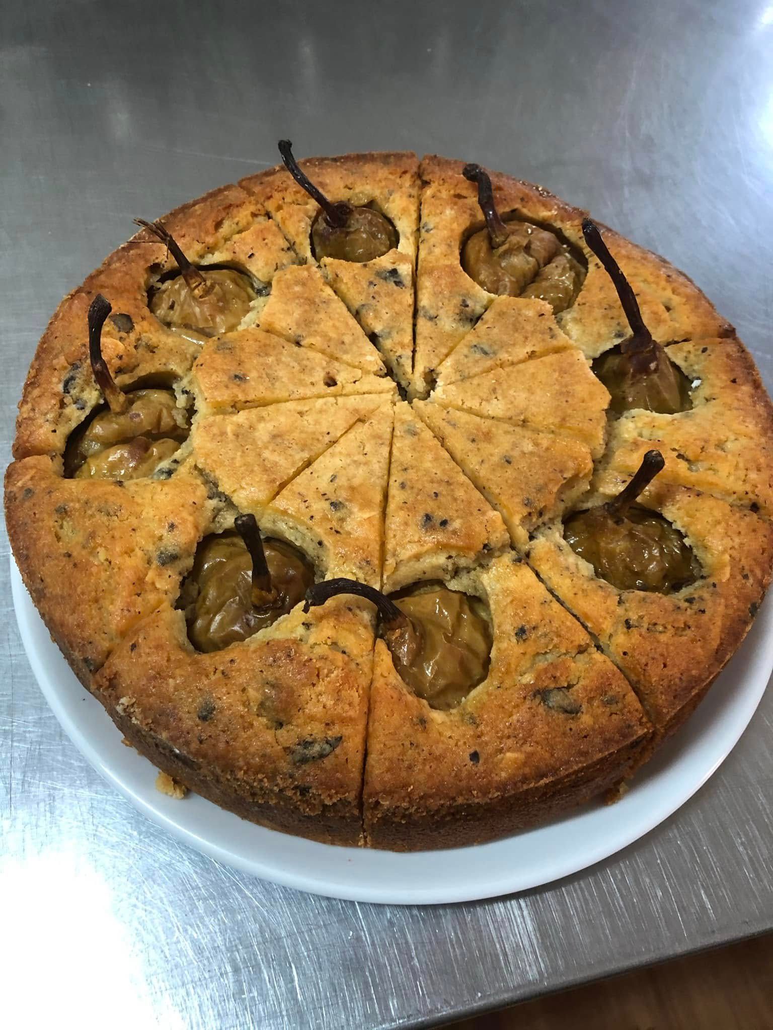 Pear Cake on A White Plate, Cut Into Triangular Slices — Kape Centro In Childers, QLD 