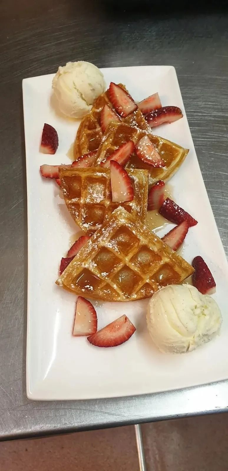 Waffles with Strawberries and Ice Cream on A Rectangular White Plate — Kape Centro In Childers, QLD 