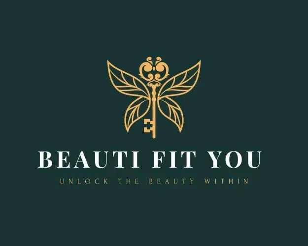 A golden logo of a butterfly with key-shaped wings with the text 