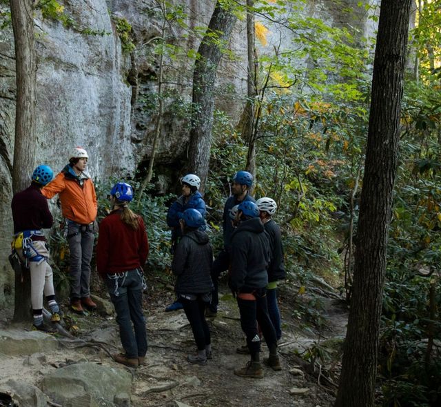 Small group of climbers listening to an instructor