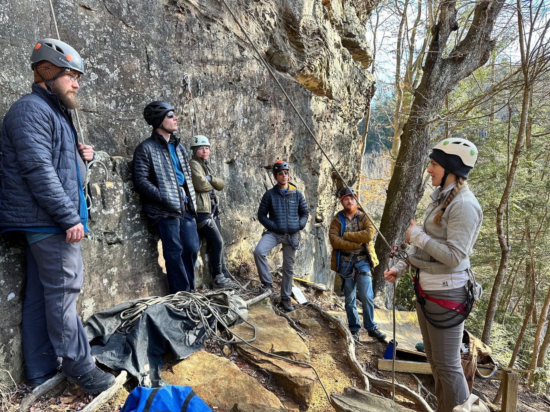 Corporate group climbing together on the Via Ferrata at Red River Gorge, Kentucky