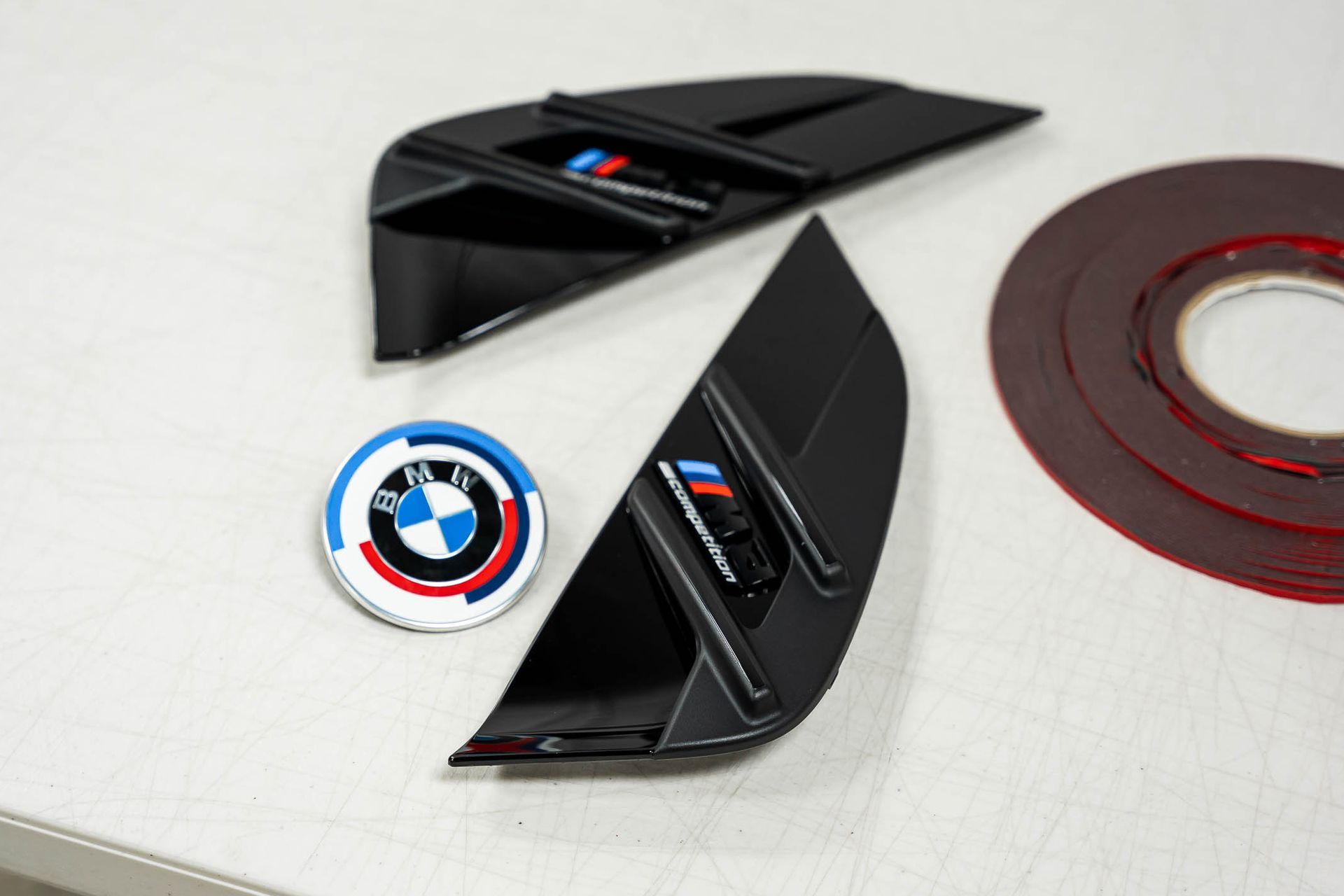 A close up of a bmw emblem on a table