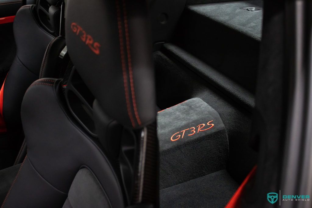 A close up of the back seat of a porsche 911 gt3 rs.