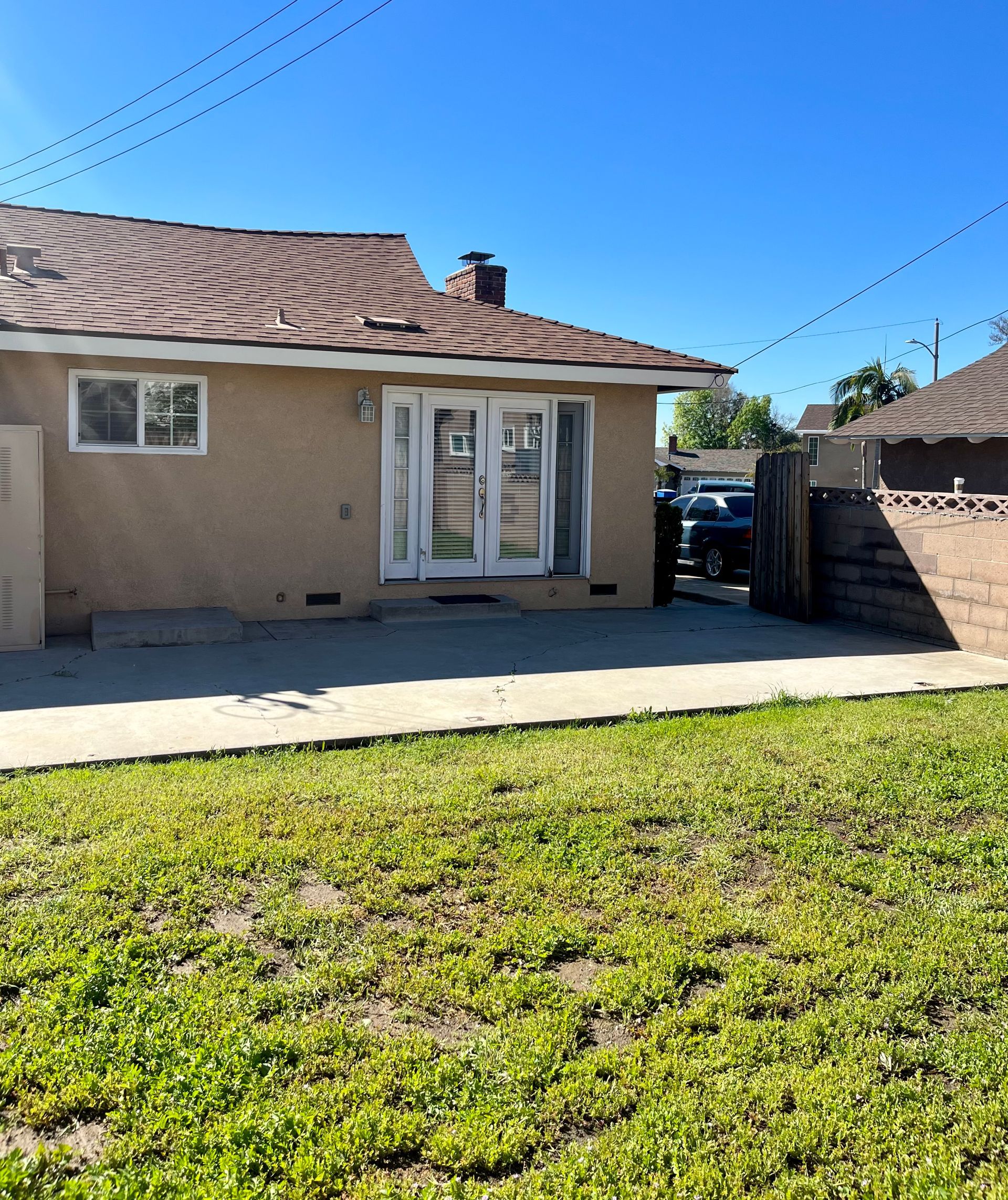 A house with a lot of grass in front of it