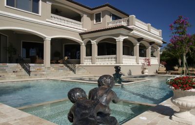 Pool beside a mansion - Pool & Deck Construction in Sarasota, FL