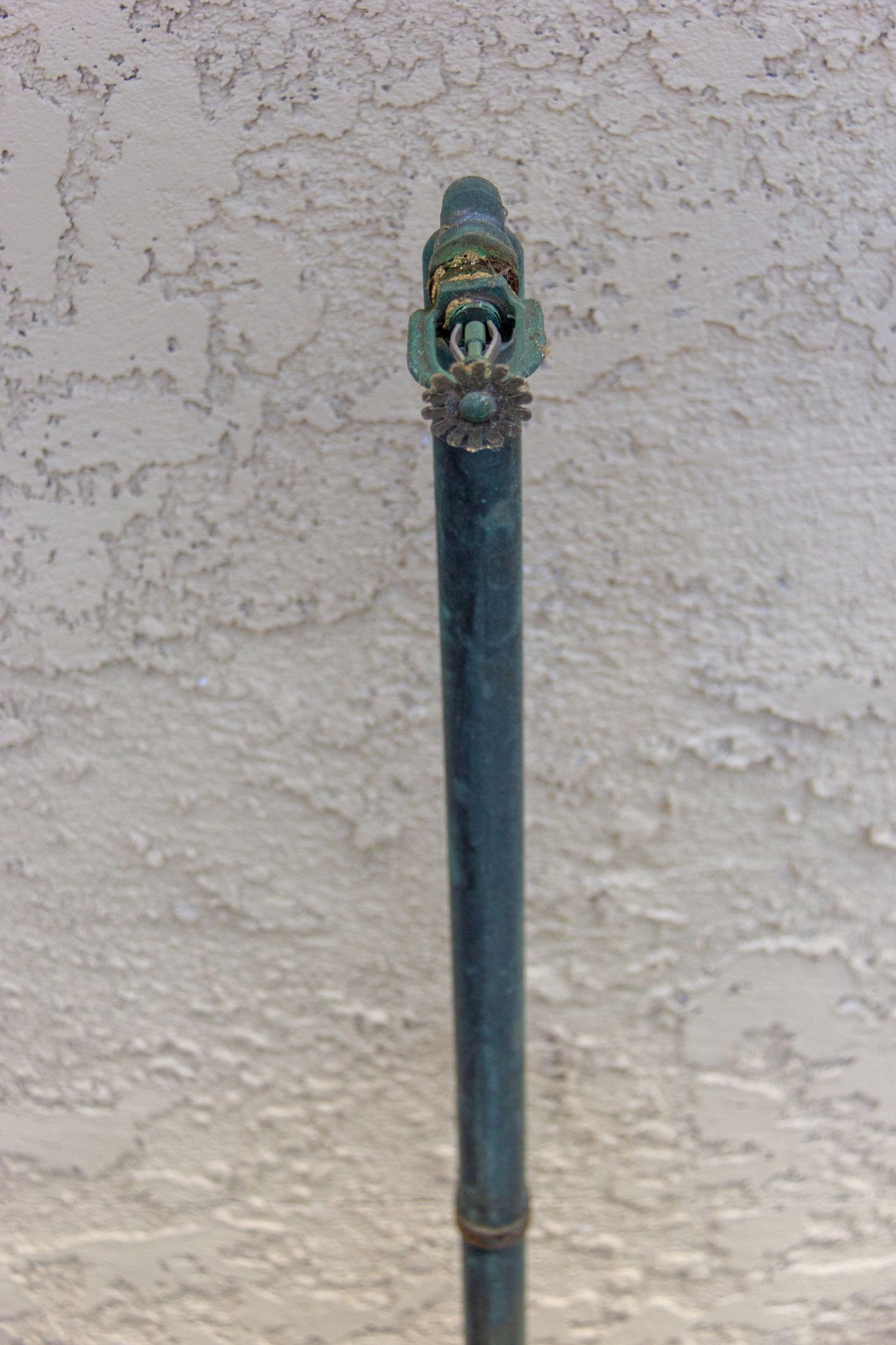 A Close up of a Water pipe Against a White Wall - Fire Sprinkler Services in Fort Wayne, IN