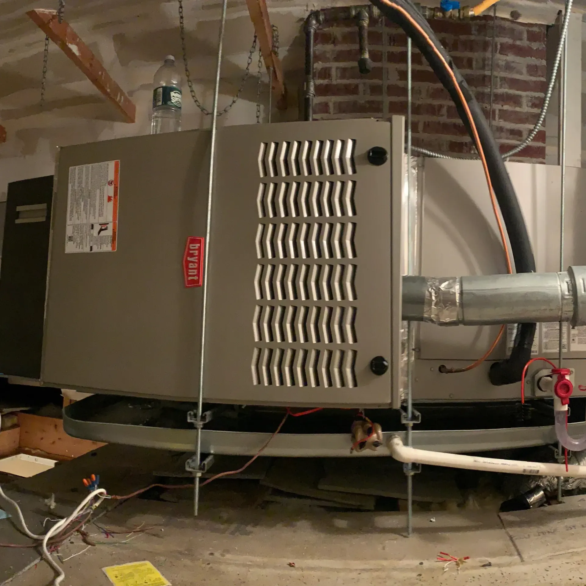 Apex Climate Control - An air conditioner with a label on it that says ' i-coil '