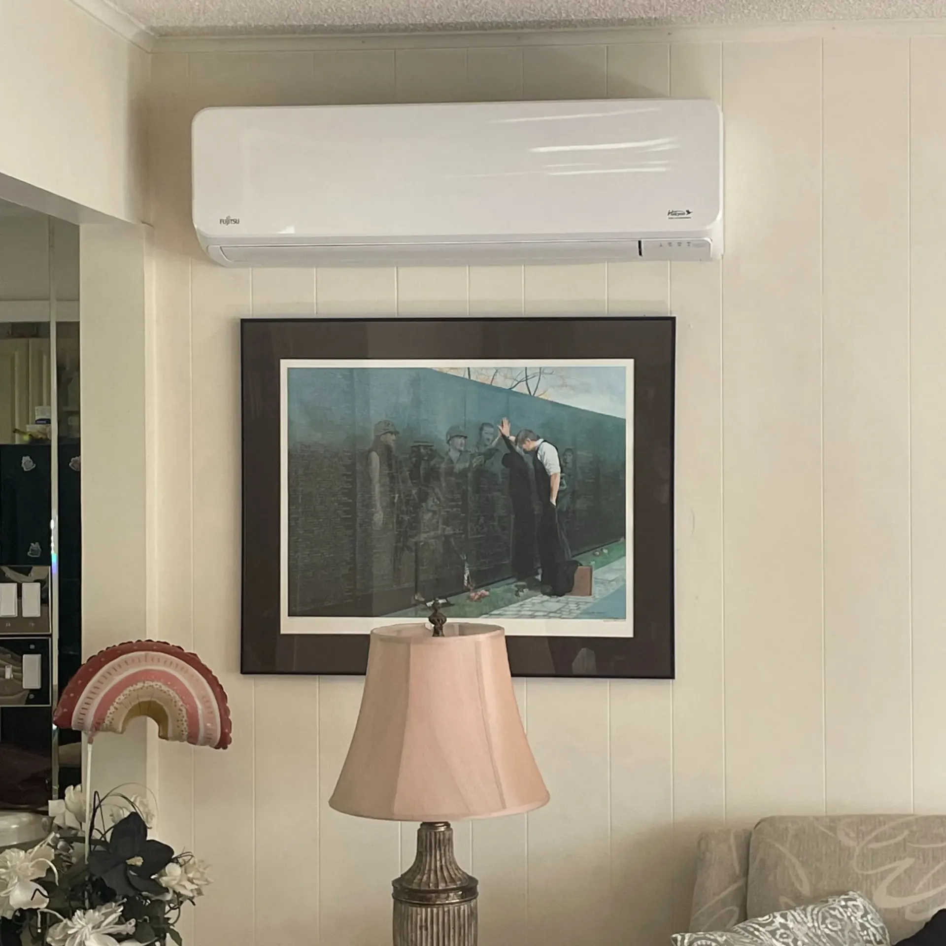 Apex Climate Control - A floodstop device is plugged into a wall