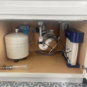 Apex Climate Control - There is a water filter under the sink in the cabinet.