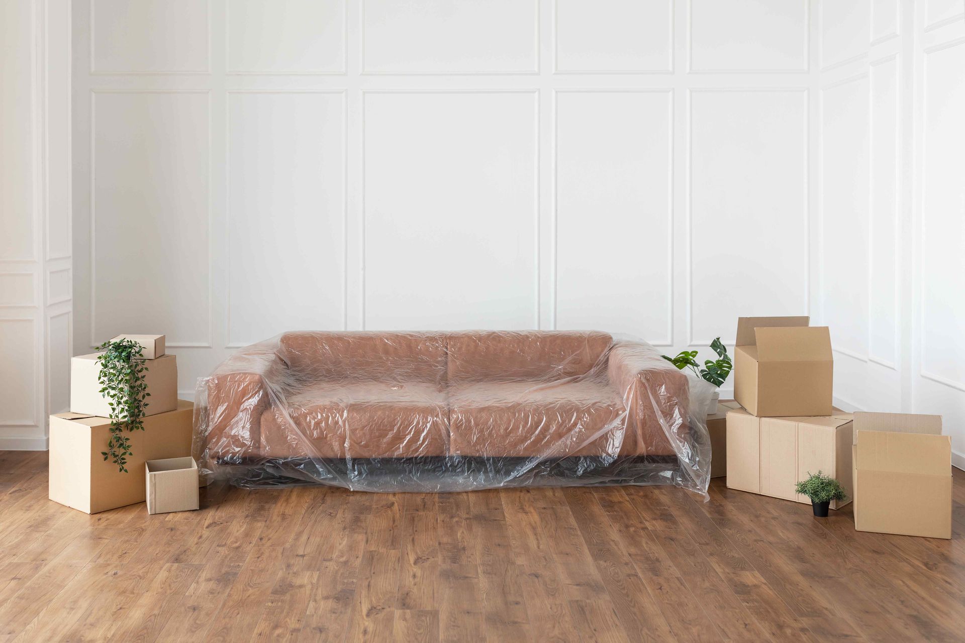 a brown couch wrapped perfectly