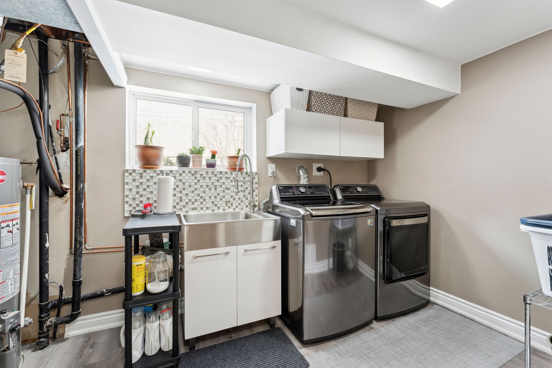 Laundry room with S/S washer/dryer