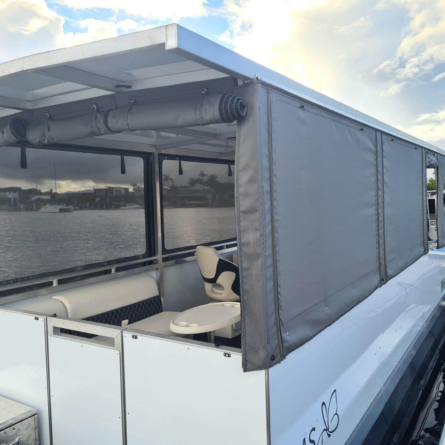 A Boat With Rolling Curtains and Blinds on the Outside — The Boat Cover Company In Buddina, QLD