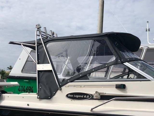 Tan and Black Boat Cabin With Clear Windows — The Boat Cover Company In Pelican Waters, QLD
