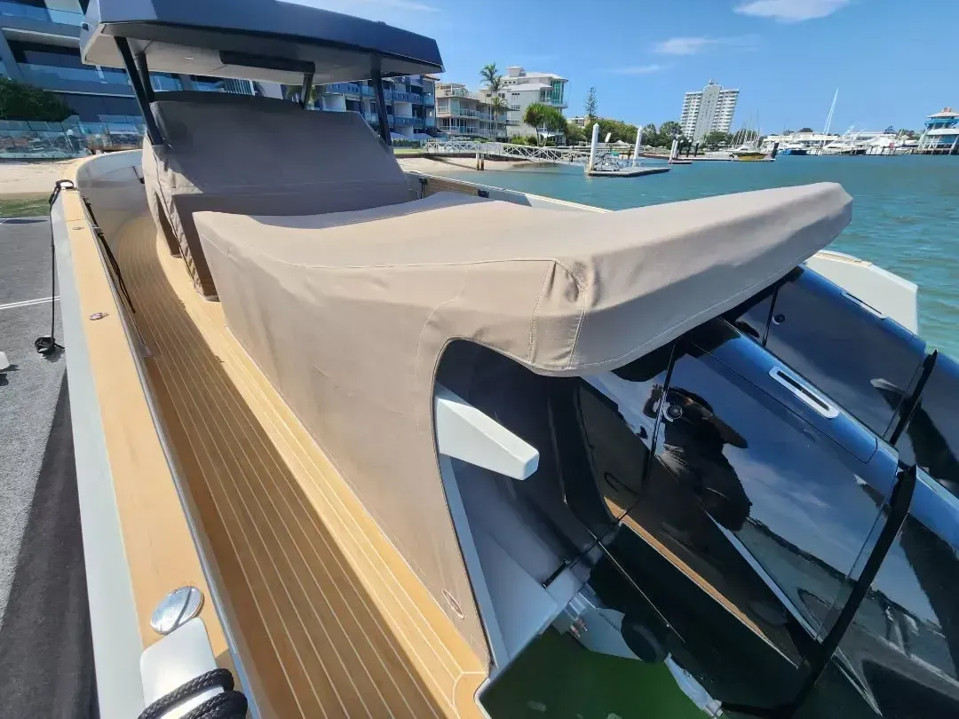 Tan and Black Motorboat With Covered Seating Area — The Boat Cover Company In Buddina, QLD